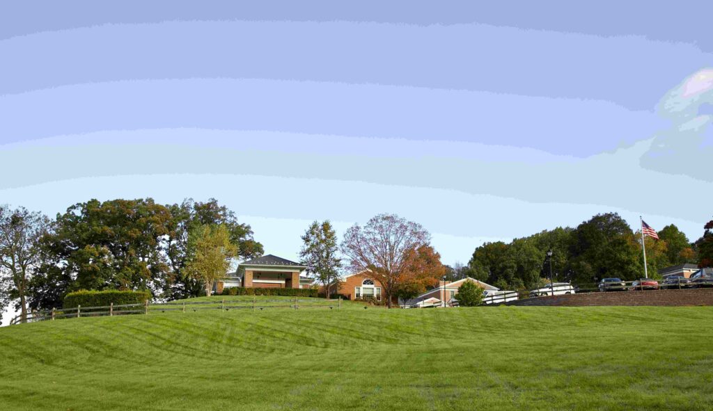 A view of the main campus from the front lawn.