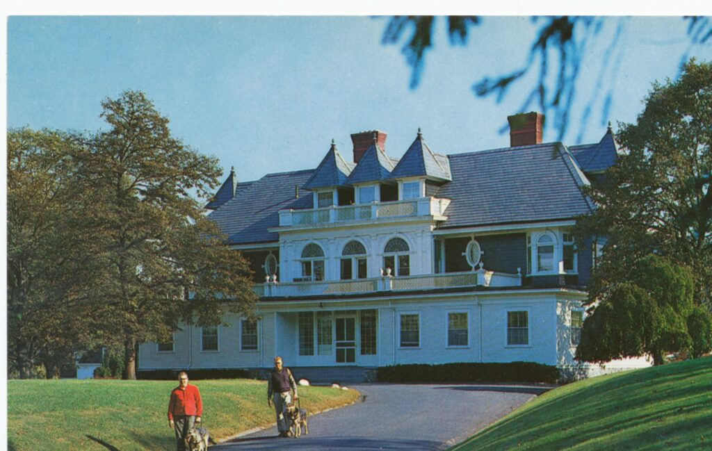 Students are guided on the driveway in front of the Whippany House, The Seeing Eye's first campus.